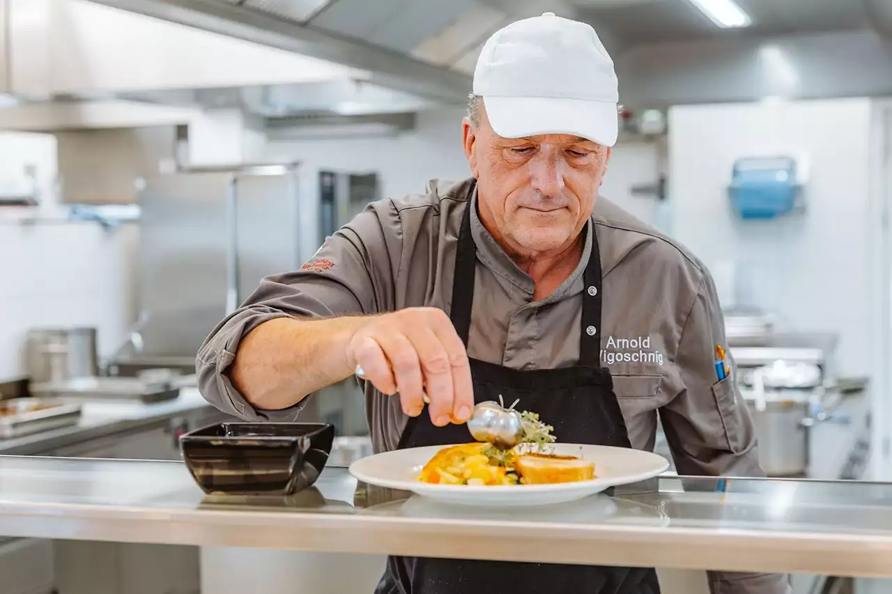 Das Bild zeigt eine Speisenzubereitung 